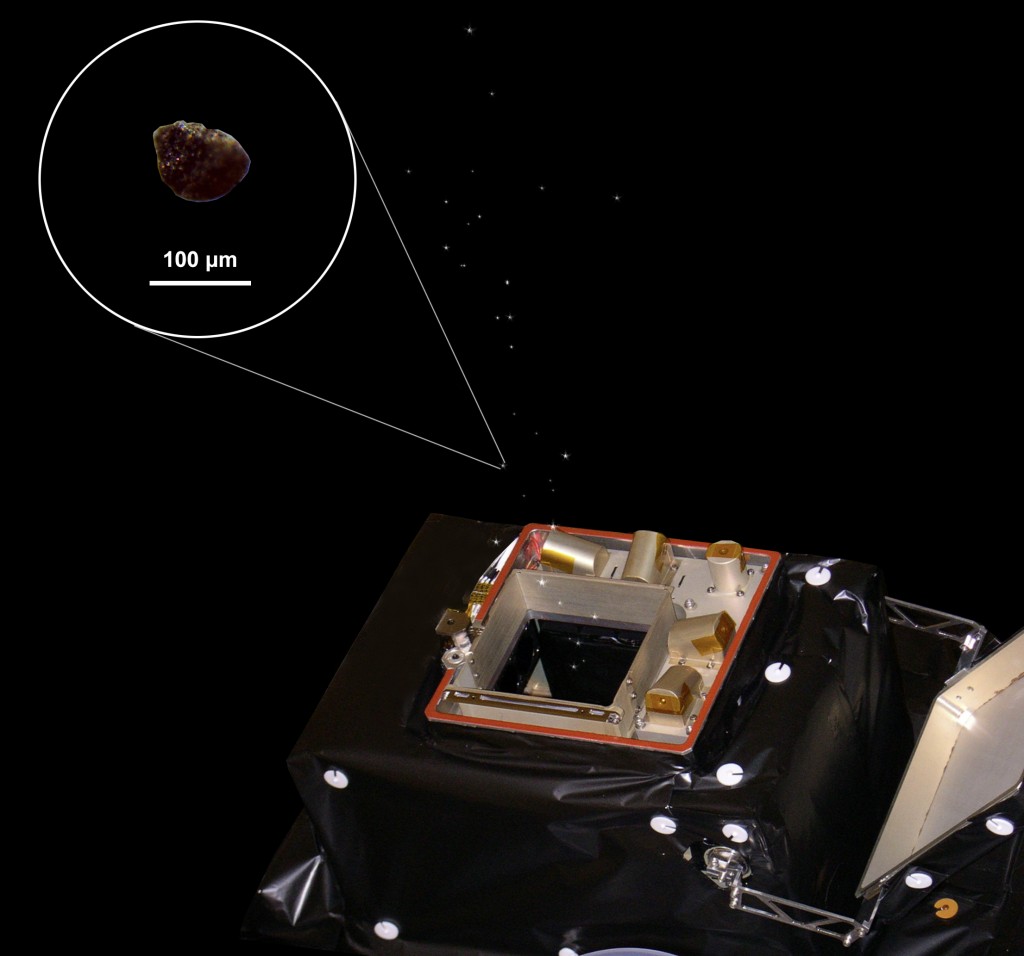 Künstlerische Darstellung von GIADA, dem Grain Impact Analyser auf der Raumsonde Rosetta. Das Bild zeigt ein durch ein Stereomikroskop vergrößertes 100 Mikrometer großes Staubkorn.