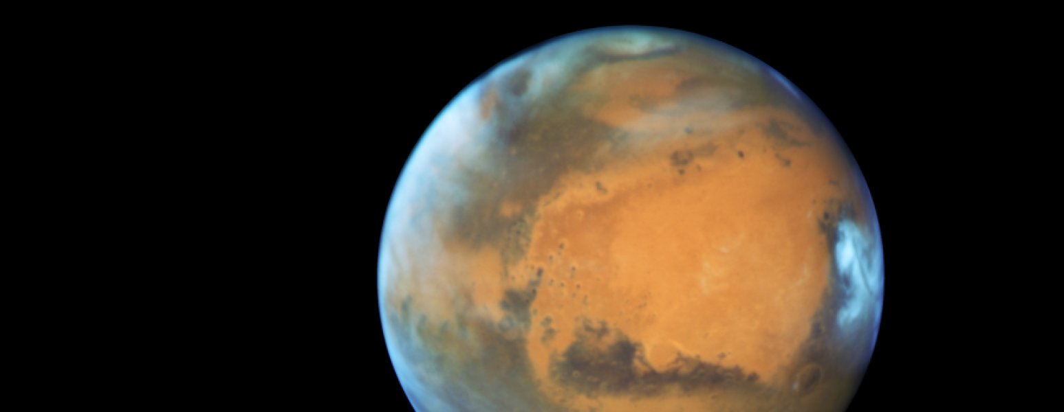 Hubble machte diese Aufnahme vom Mars, als der Planet während seiner letzten Opposition im Jahr 2016. Bild: NASA, ESA, Hubble