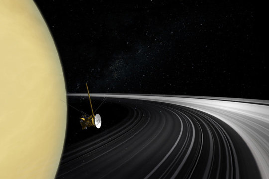 Künstlerisches Konzept des Cassini-Orbiters, beim Durchqueren der Ringebene des Saturn. Bild: NASA/JPL-Caltech